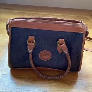 Dooney and Bourke- All Weather Leather satchel purse. Very dark blue.